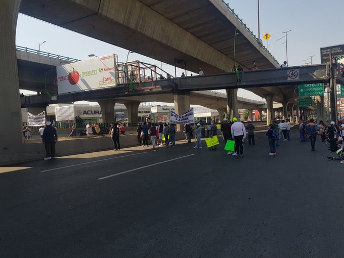 Colapsa Periférico Norte por bloqueo de comerciantes