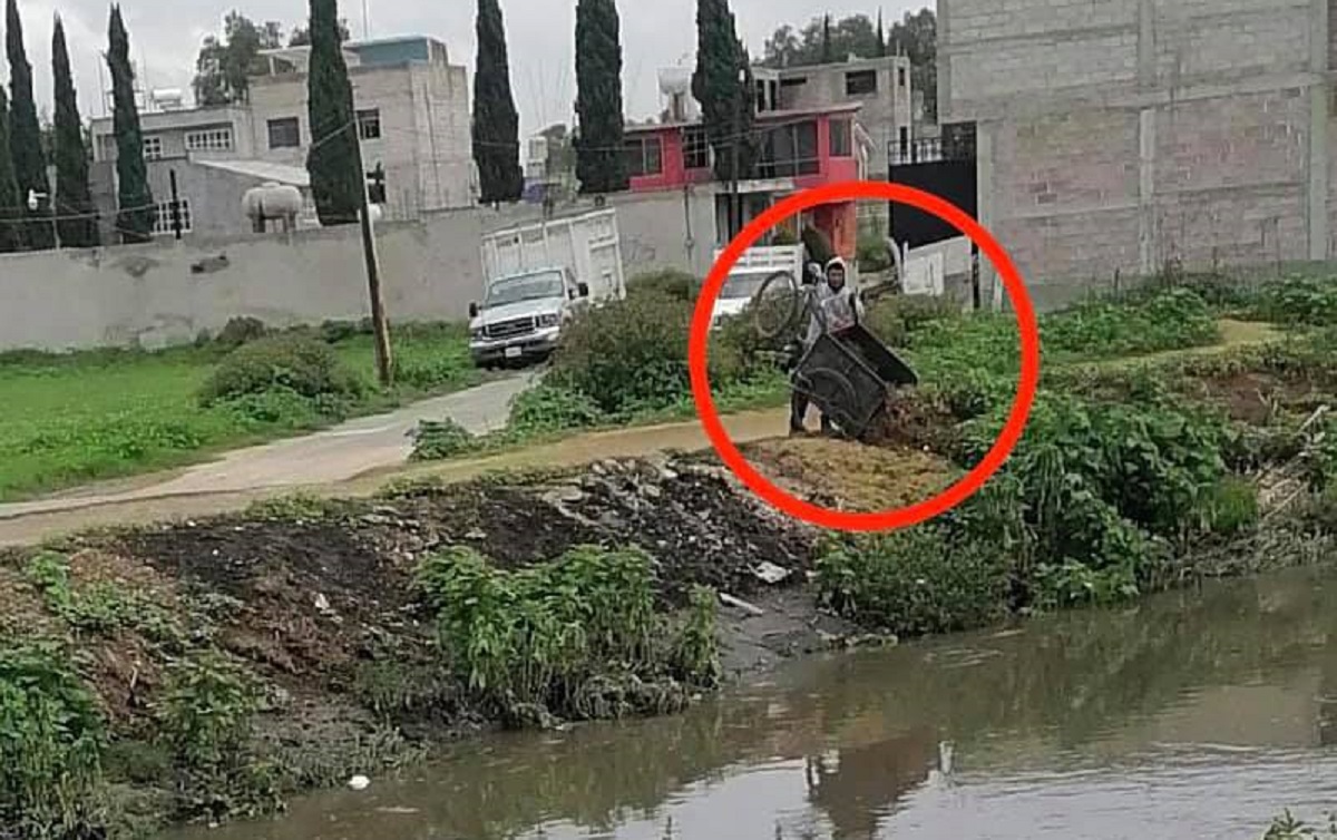 Sujeto arrojando basura